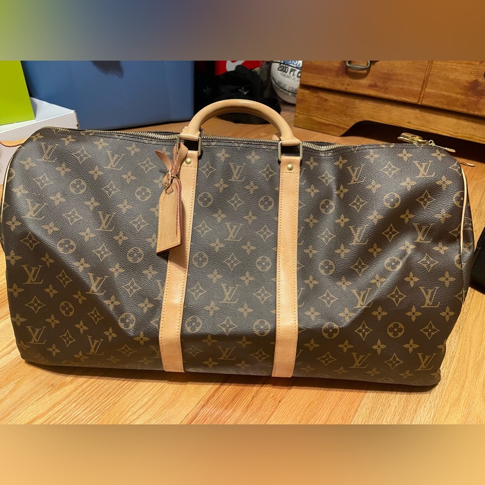 Louis Vuitton Travel bag! Gently used a few times. Comes with  box/dust bag